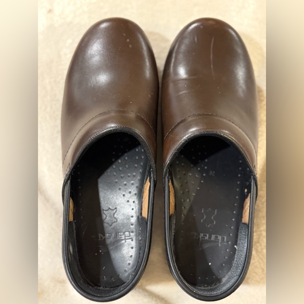 Dansko Clogs Women’s size 39. 
Dark brown leather clog
Worn 2 times